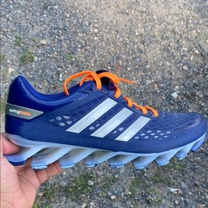 Adidas Men's 10.5 shoesSpringblade Navy Athletic Shoes with Bright Orange Laces